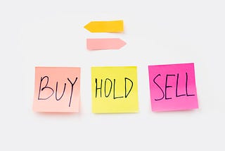 Image of 3 post it notes — buy, hold, and sell respectively