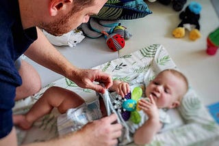 Everything a New Dad Needs to Know About Baby Poo and Changing Nappies