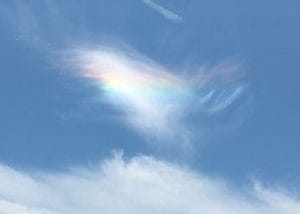Brilliant rainbow in a cloud