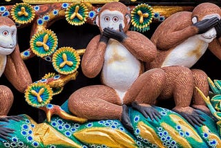 Woodcarving of the Three Wise Monkeys of Nikko, Japan