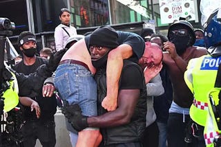 Patrick Hutchinson rescues a man from a beating