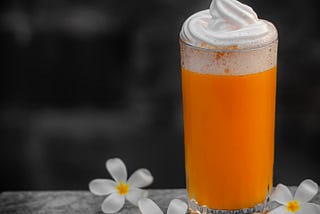 Summer Vibes with a Spicy Mango Cocktail topped with an Aperol Foam