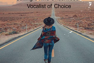 Country album cover with a woman walking down the road wearing a jeans, cowgirl hat & boots. Text says “Make A U-Turn,” the name of the song and “Calling Carrie Underwood, Vocalist of Choice.” Lyrics by Marilyn Glover. A song written for Carrie.