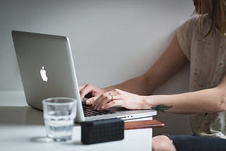 A woman writer on a laptop achieving her dream