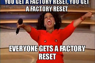 Oprah Winfrey with both hands raised while holding a black microphone on right hand. She looks ecstatic and excited with her mouth wide open as if shouting something. A text says ‘You get a factory reset. You get a factory reset. Everyone gets a factory reset.’