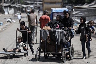 The stench of gunpowder and fire blankets the sky of Gaza… it chokes our lungs, and we can barely…