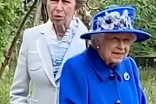 Queen looks radiant in vibrant coat and matching hat as she joins Princess Anne in Scotland