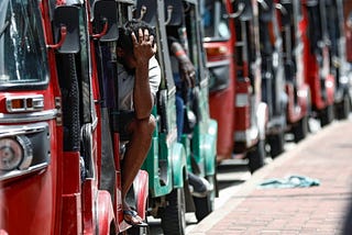 Rickshaws line up to buy fuel in Sri Lanka