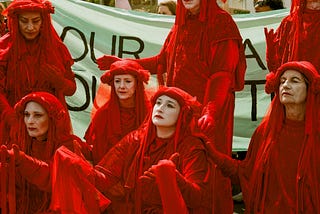 Photos: Hundreds march to Parliament over climate crisis