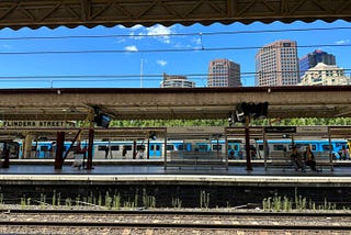 Find where the buildings and the station are in the Image!