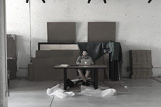 Will Turnage, I&CO’s Director of Technology, setting up WiFi in our first office (2016)