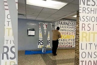 FBI wall being painted over