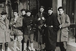 A black and white photo of paramilitary figures in 1920s Ireland