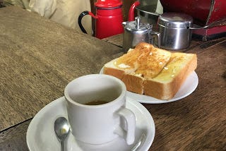 Coffee and Toast in a Fish Market