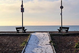 The Shoreham Beach boardwalk coated in frost on a winter’s morning. 