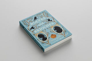 Photo of the paperback version of Wolves and Brioches