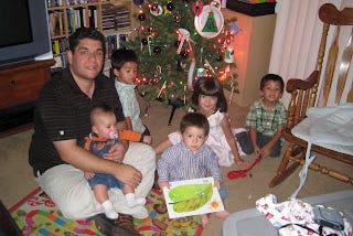 My ex-husband and five children at Christmas time are in Sierra Vista, Arizona.