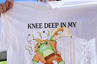 “Frog Knee Deep in My Forsaken Era” Merch: A Humorous Embrace of Tough Times