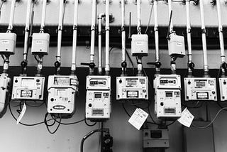 A row of gas meters, black and white photograph by MIKI Yoshihito