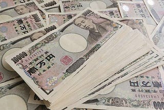 Pile of Japanese 10,000-yen notes