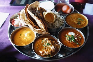 Why do Indians prefer to eat Indian food when abroad?