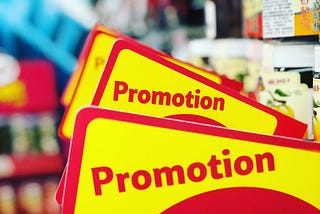 Signs in a retail store saying “Promotion”