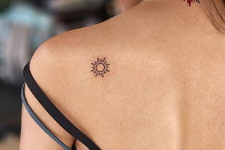Bold Tiny Sun Tattoo Designs on Back