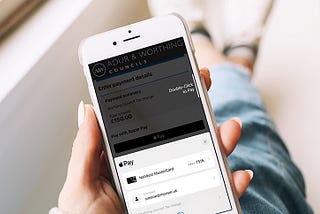 Photo: Paying for a council service using Apple Pay on a mobile phone