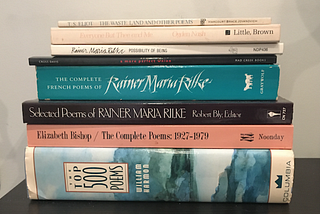 a pile of poetry books