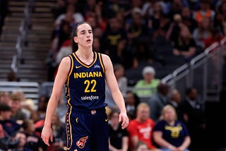 Caitlin Clark catches her breath during an Indiana Fever game.