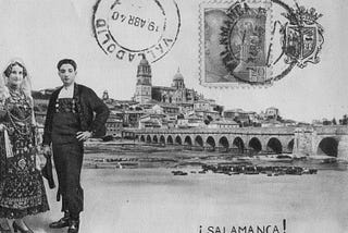 An antique postcard of Salamanca, Spain, showing two figures in traditional dress and a city view, with stamps and franking marks
