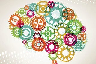 Illustration of a brain shape made from colorful interlocking gears.
