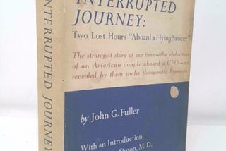 Showing an original hardbound copy of The Interrupted Journey with dust acket.