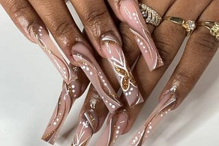 Super Long artificial fingernails trend in Nigeria — 2Dots Market Blog -