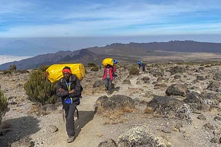 A Day in the Life of Porters on Kilimanjaro | Kilimanjaro Sunrise A Trekking Company