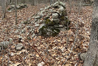 “False-Front” or “Spilling” Cairn-like Stone Structures in Rhode Island