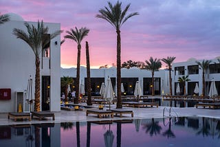 A beautiful swiming pool in a hotel, representing the question "Are Hotels/Resorts a good career path?"