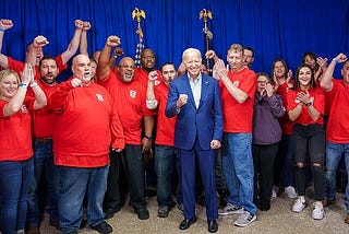 Biden with workers (Creative Commons)