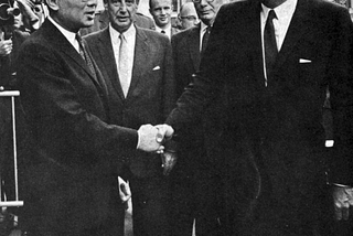 U Thant, Adlai Stevenson, and President Kennedy outside UN Headquarters in New York.