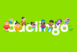 Eddy, Junior, Lucy, Lin, Oscar, Vikram, Bea, Lily, Zari and Duo are posing around the word, Duolingo