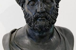 What is Pythagoras’s theory of “Music of Spheres”?