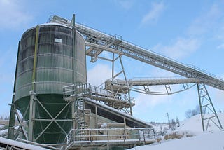 refinery surrounded by snow