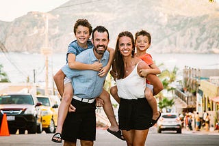 Finnegan (far right) and his family on vacation