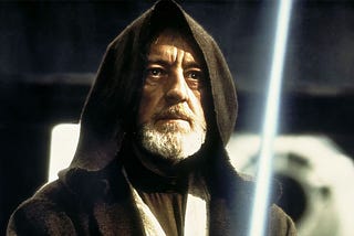 Obi-Wan Kenobi wields a lightsaber