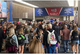 Photo of a large crowd at the National Cheerleaders Association competition in Dallas.