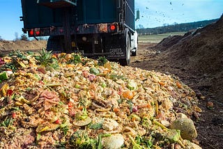 Rotting food dumped by a truck