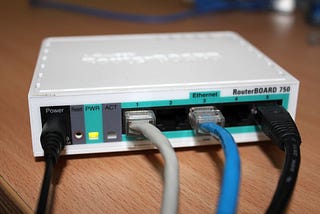 Mikrotik Rb750, router, router with cables connected