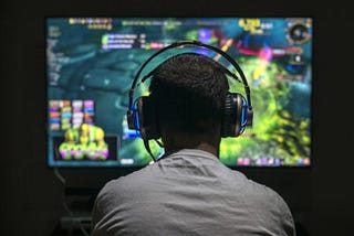 Why do people enjoy watching others playing games?