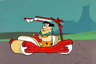 FlintMobile from the Flintstones — This is to communicate how you can build a bare minimum of something to get the job done. In the flintstones, the FlintMobile doesn’t have wheels, it’s just Fred Flintstone pushing it with his feet.