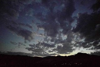Photo of dark clouds at sunset